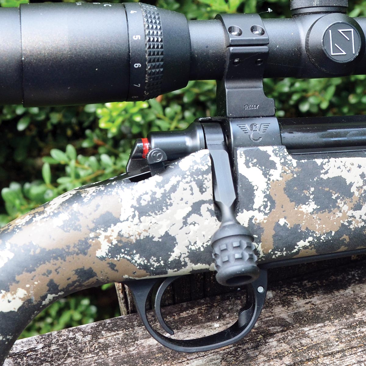 A red band in view at the rear of the bolt shroud indicates a cocked firing pin. While “tactical-style” bolt handle knobs are all the rage, Layne prefers a smooth knob on a rifle intended for hunting big game.